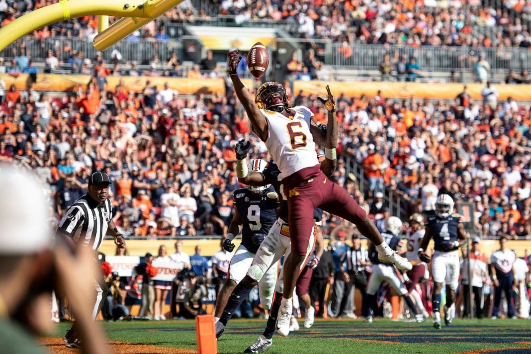 Minnesota wide receiver Tyler Johnson reaches for a pass that he caught for a touchdown late in the second quarter against Auburn in the Outback Bowl NCAA college football game Wednesday, Jan. 1, 2020, in Tampa, Fla. (Aaron Lavinsky/Star Tribune via AP)
