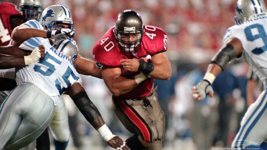 Fullback Mike Alstott #40 of the Tampa Bay Buccaneers rushes against the Detroit Lions at Raymond James Stadium on October 19, 2000 in Tampa, Florida. The Buccaneers lost 14-28. (photo by Robert Rogers/Tampa Bay Buccaneers)