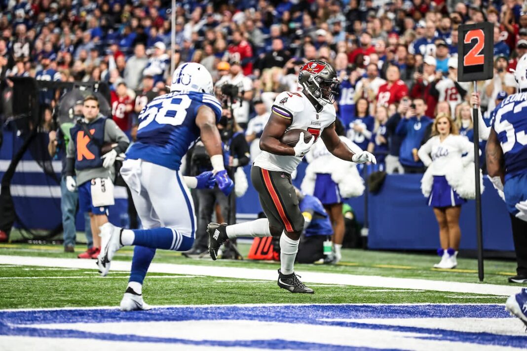 Buccaneers running back Leonard Fournette scores against the Indianapolis Colts/via buccaneers.com