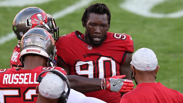 Tampa Bay Buccaneers outside linebacker Jason Pierre-Paul (90) celebrates after recoving a fumble by Minnesota Vikings quarterback Kirk Cousins during the second half of an NFL football game Sunday, Dec. 13, 2020, in Tampa, Fla. (AP Photo/Mark LoMoglio)