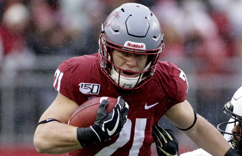 Should the Buccaneers draft Washington State running back Max Borghi?/Young Kwak / AP