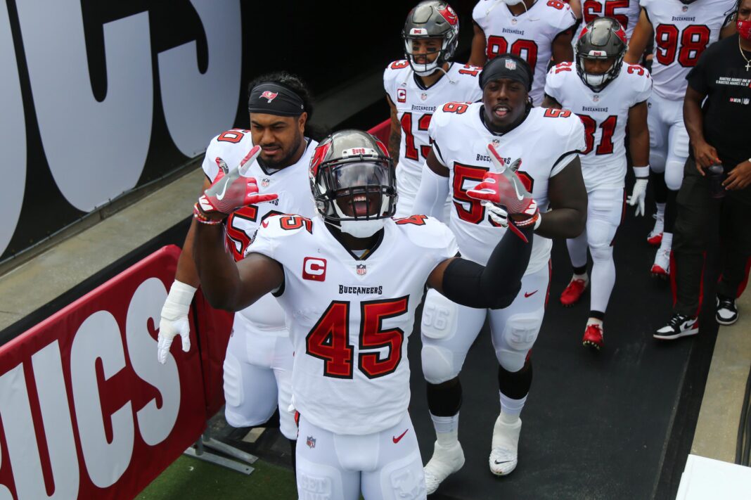 Sep 20, 2020; Tampa, Florida, USA; Tampa Bay Buccaneers linebacker Devin White (45) runs out to the field with teammates before the game against the Carolina Panthers at Raymond James Stadium. Mandatory Credit: Kim Klement-USA TODAY Sports