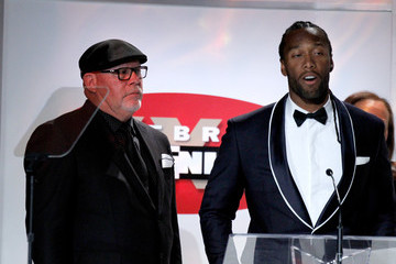 Former Buccaneers head coach Bruce Arians and former Arizona Cardinals wide receiver Larry Fitzgerald/via Getty Images