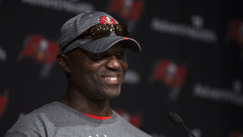 Tampa Bay Buccaneers head coach Todd Bowles talks with reporters/via Tampa Bay Times