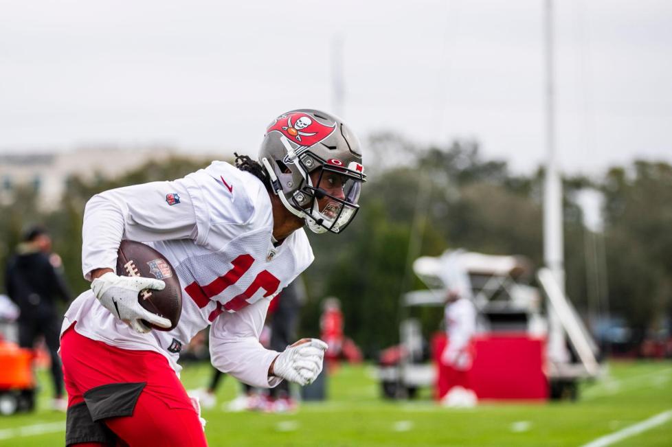 Buccaneers wide receiver Travis Jonsen runs forward with the ball during a Jan. 13 practice at AdventHealth Training Center in Tampa, Florida/via buccaneers.com