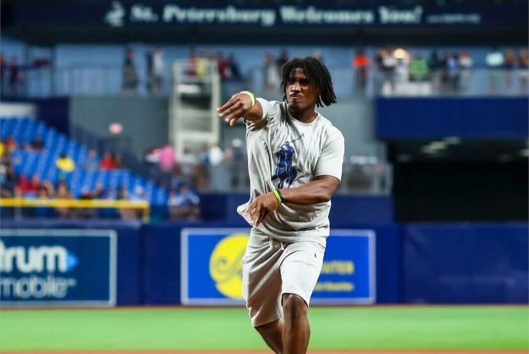 Buccaneers' Rookie running back Rachaad White throws out the first pitch for the Tampa Bay Rays/via Tampa Bay Buccaneers