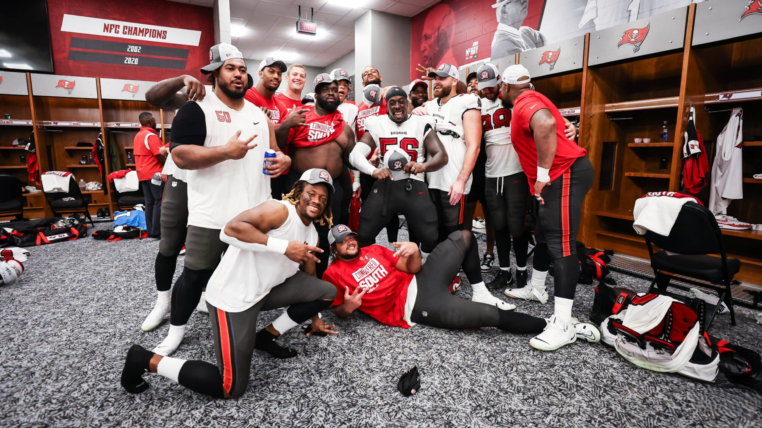 Buccaneers' players celebrate their division title / via buccaneers.com