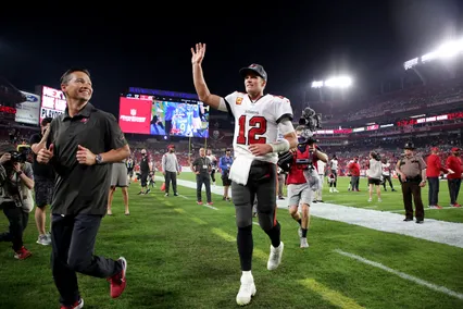 Quarterback Tom Brady (12) leaves the field following the Bucs' victory over the Carolina Panthers Sunday at Raymond James Stadium. [ DOUGLAS R. CLIFFORD | Times ]
