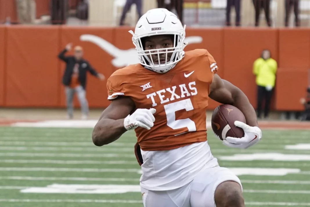 University of Texas running back Bijan Robinson is moving up several NFL draft big boards. Should the Buccaneers look into drafting him? / via Associated Press