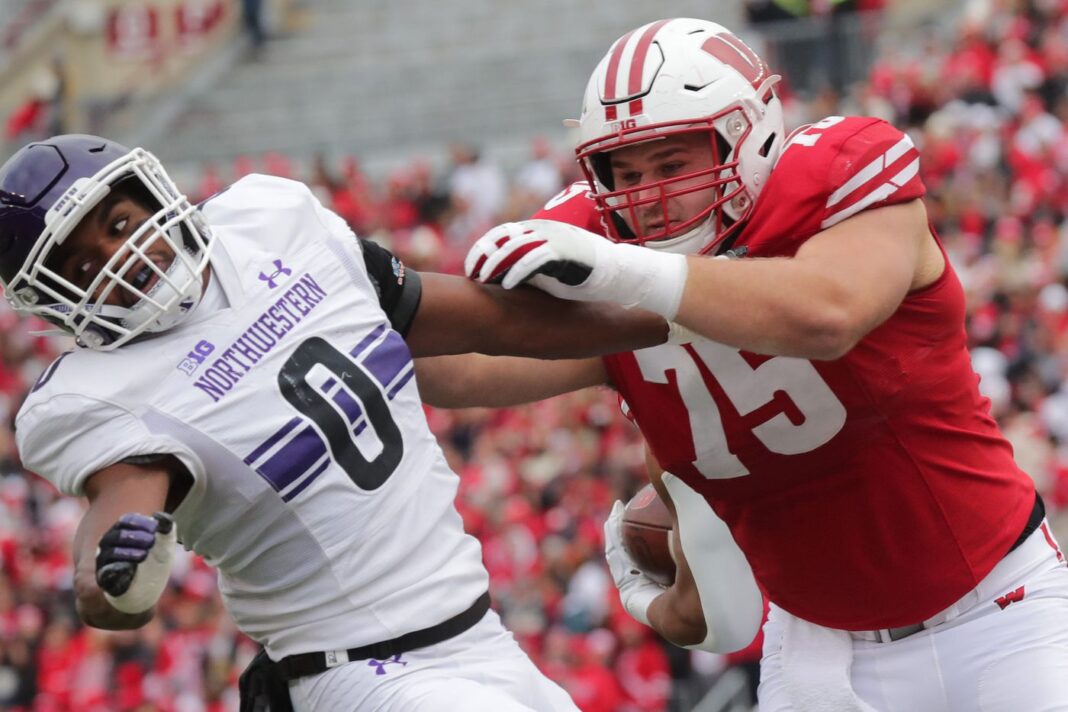 University of Wisconsin offensive lineman Joe Tippman is moving up several NFL draft big boards / via USA Today