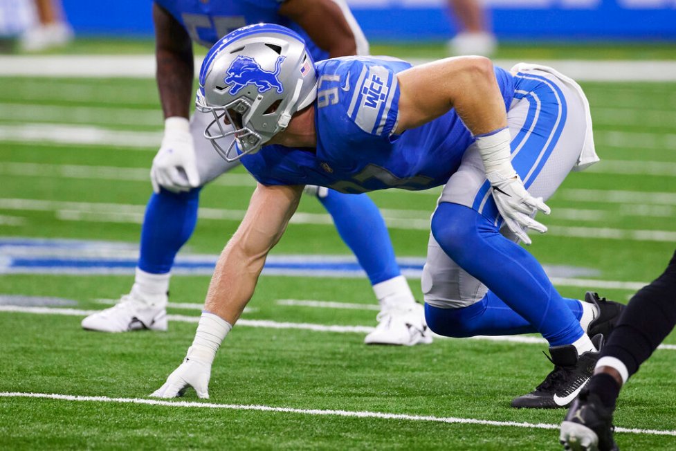 The Buccaneers' offensive line will have their hands full with the Lions' Aidan Hutchinson / AP Photo/Rick Osentoski