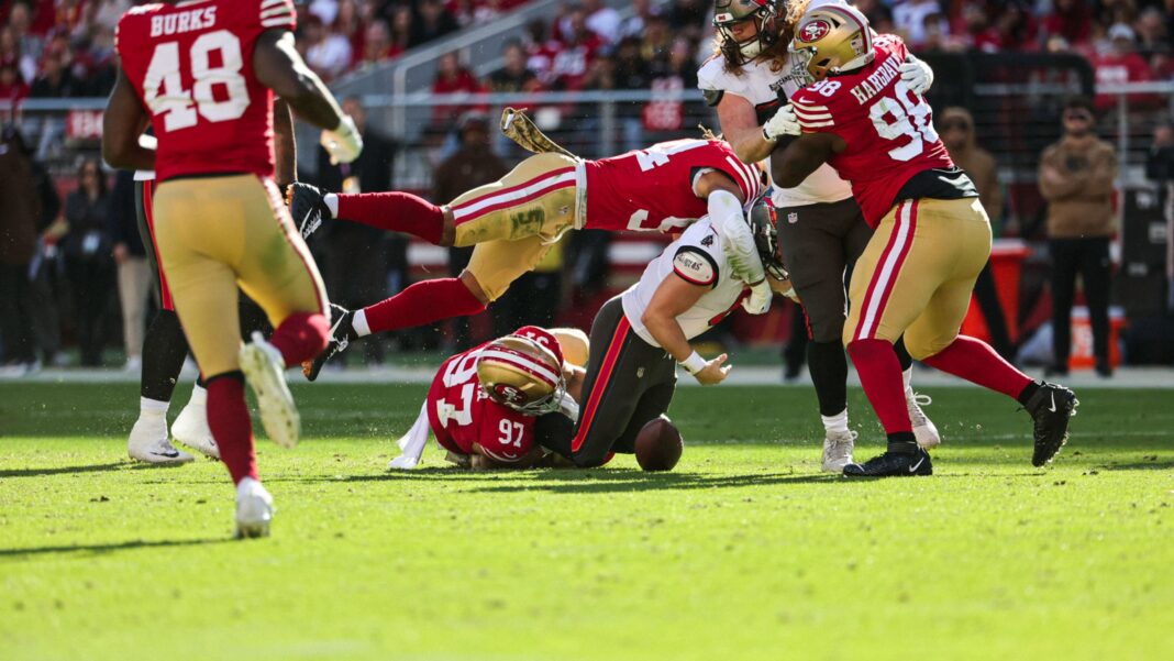 Buccaneers quarterback Baker Mayfield is sacked by the San Francisco 49ers defense / via 49ers.com